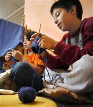who_knits_young_boy_knitting